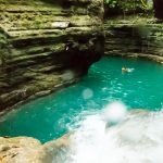 Trailing the river that pumps the majestic Kawasan Waterfall